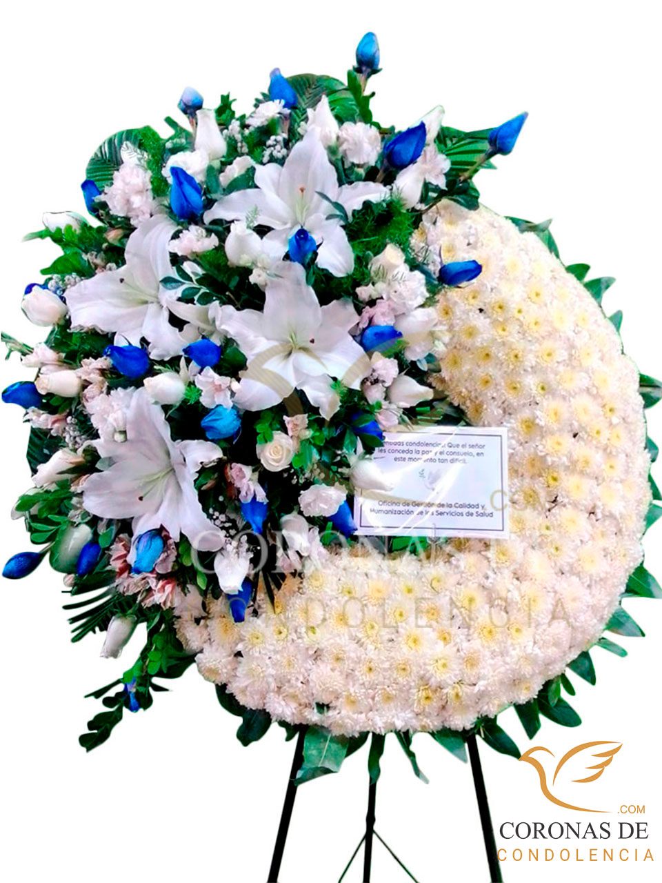 Corona fúnebre de 2 m de alto , elaborada con, rosas azules importadas ,, 4 lilium, pompo ,y otros complementos de flores y lindos follajes en parante de fierro pitando al tono